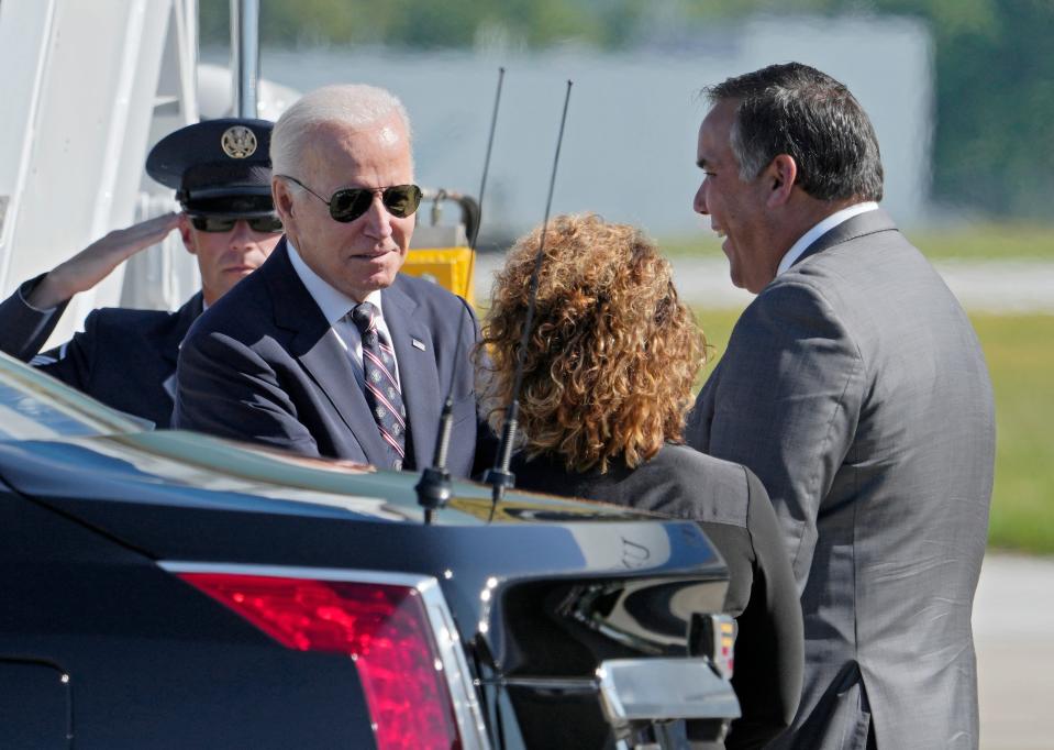 President of the United States Joe Biden meets Columbus Mayor Andrew Ginther, right, after arriving at John Glenn International Airport in Columbus, Oh. on Friday on his way toto the groundbreaking of Intel's semiconductor factories in Licking County. Barbara J. Perenic/Columbus Dispatch
