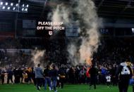 Britain Football Soccer - Hull City v Derby County - Sky Bet Football League Championship Play-Off Semi Final Second Leg - The Kingston Communications Stadium - 17/5/16 Hull fans celebrate on the pitch after reaching the Sky Bet Football League Championship Play-Off Final Action Images via Reuters / Craig Brough