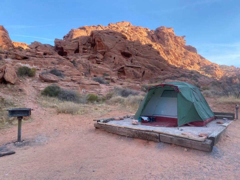 Valley of Fire State Park's striking landscape comes from red Nevada sandstone outcrops set among gray and tan limestone mountains.