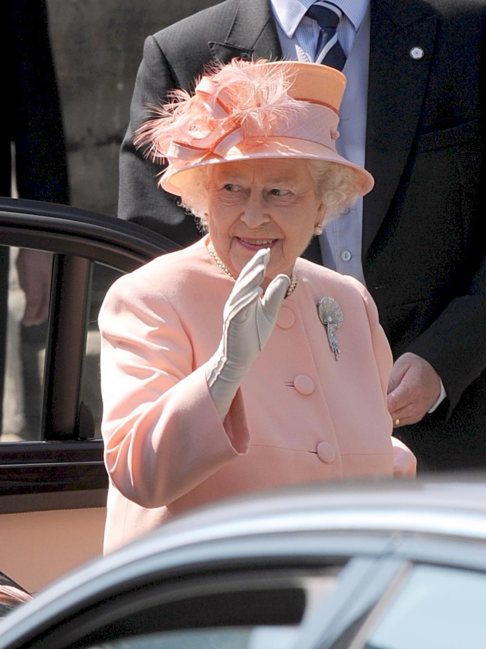 Queen Elizabeth II wearing her late mother's brooch for the wedding of Zara Phillips and Mike Tindall in 2011. (PA)