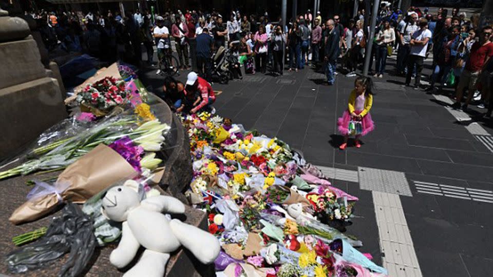 A floral tribute continues to grow near the Bourke Street Mall. Source: AAP