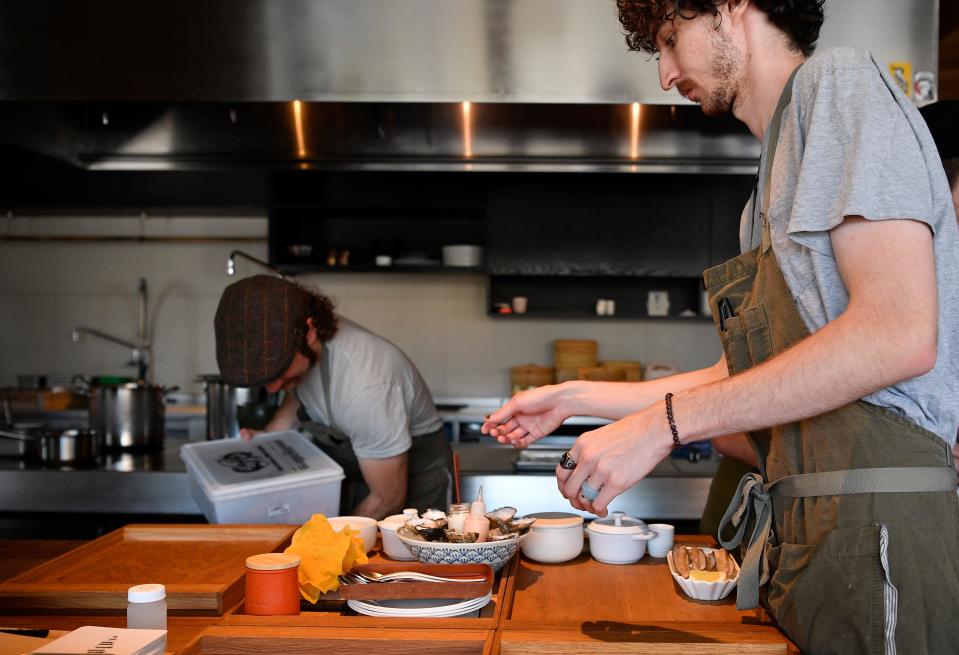 Food is set on wooden boards to be served at Locust in Nashville, Tenn., Friday, Sept. 15, 2023.