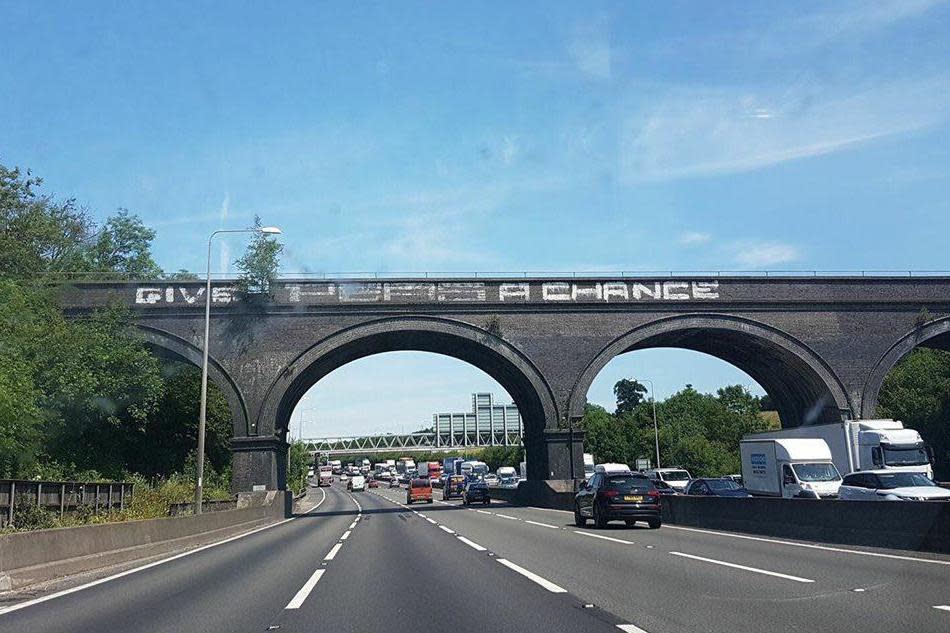 The iconic 'Give Peas a Chance' graffiti on the M25 has been replaced: Marc P Summers