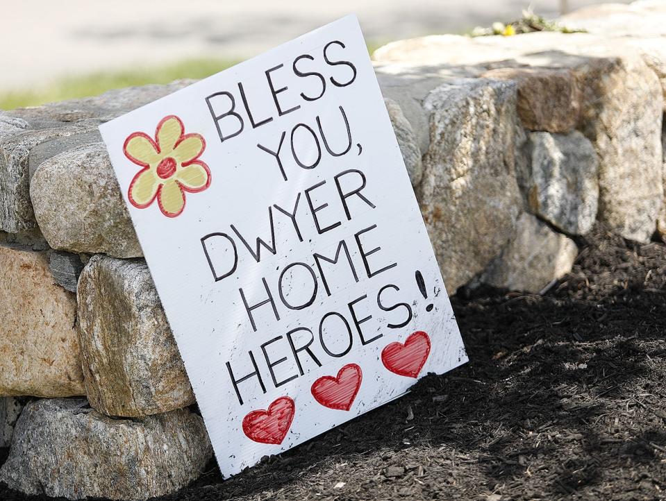 A sign showing support for those working at the Dwyer Home, a nursing facility in Weymouth.