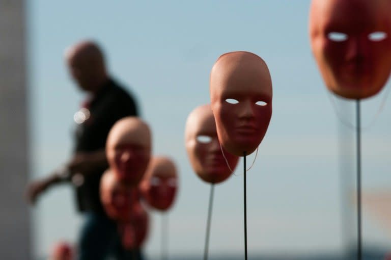 A protest against political corruption scandals in Brazil on Tuesday placed 595 masks -- one for President Michel Temer and each legislator accused -- in front of Congress