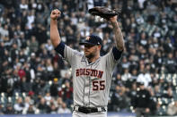 Houston Astros relief pitcher Ryan Pressly (55) celebrates the final out against the Chicago White Sox in the ninth inning during Game 4 of a baseball American League Division Series Tuesday, Oct. 12, 2021, in Chicago. The Astros won 10-1. (AP Photo/Nam Y. Huh)