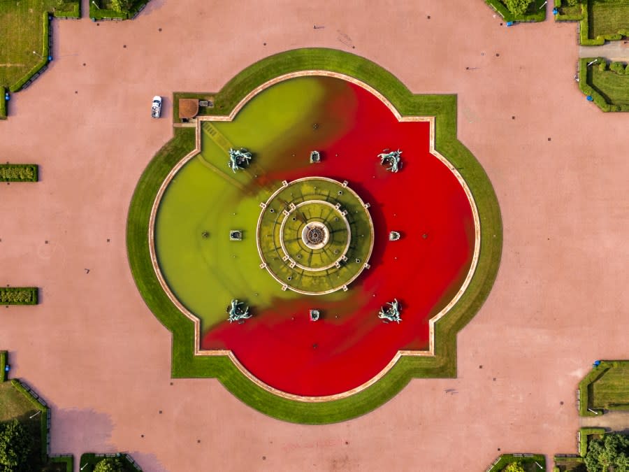 Aerial photographs of Buckingham Fountain of Pro-Palestinian protestors turning fountain green and red (Courtesy: Colin Hinkle/Soaring Badger Productions)