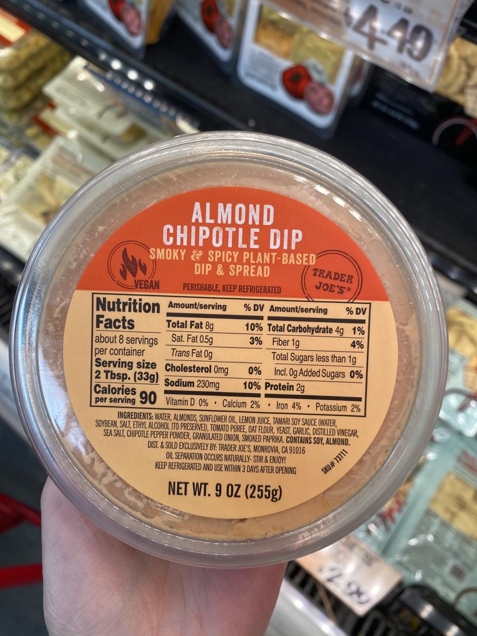 a container of trader joe's almond chipotle dip