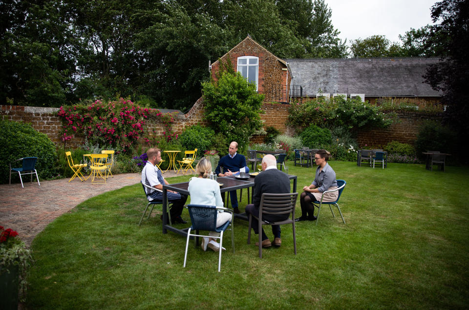 EMBARGOED TO 2230 BST FRIDAY JULY 3 The Duke of Cambridge talks to the landlords and workers at The Rose and Crown pub in Snettisham, Norfolk.