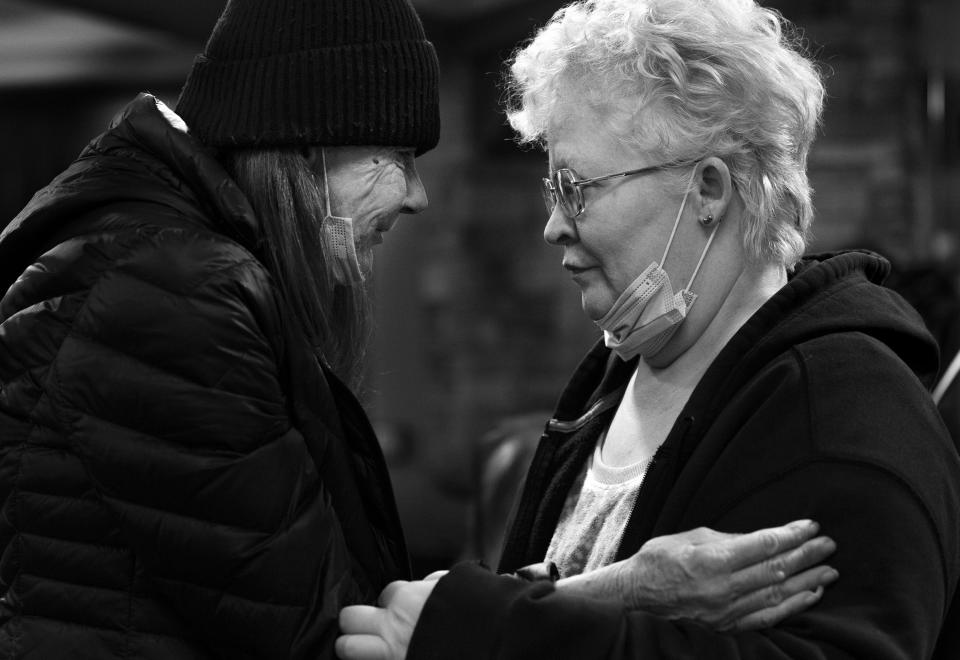 INN Between resident Patti Larsen, left, comforts Linea Trottier after a memorial service for Linea’s sister, Lisa, at the inn in Salt Lake City on Tuesday, Jan. 17, 2023. Lisa Trottier was the 114th resident at the time to die there, but her death was unexpected. | Laura Seitz, Deseret News
