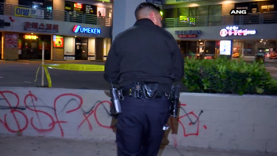 Graffiti is seen where a security guard was stabbed on April 24, 2024.