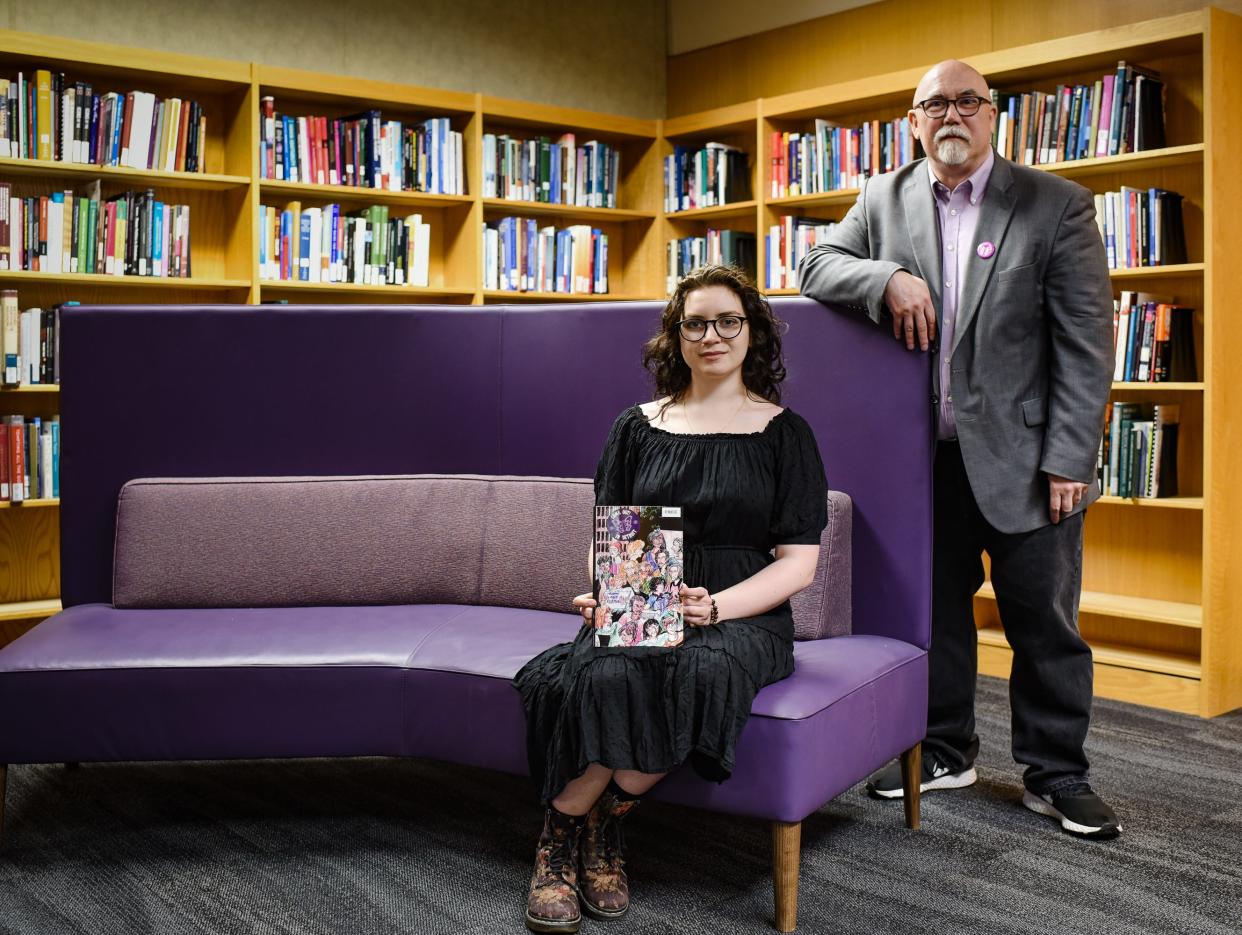 "Come Out! In Detroit" author Tim Retzloff poses for a portrait with illustrator Isabel Paul on Thursday, May 19, 2022, at the Michigan State University Library. The pair co-created a non-fiction comic book about the history of the Christopher Street Detroit march, Michigan's first gay pride march, in 1972.