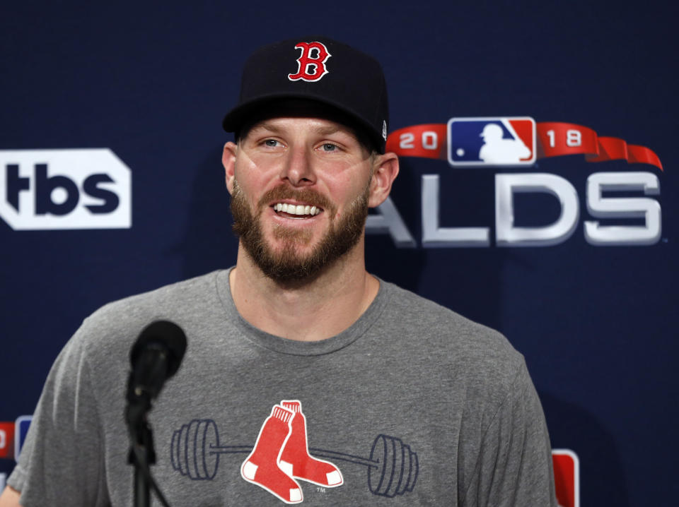Boston Red Sox starting pitcher Chris Sale speaks to media before a baseball workout at Fenway Park, Thursday, Oct. 4, 2018, in Boston, in preparation for Game 1 of the ALDS against the New York Yankees on Friday. (AP Photo/Elise Amendola)