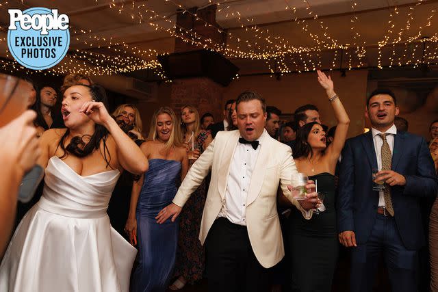 <p>Alfonso Lozano</p> Ciara Schirripa and Zach Binder dance at their wedding.
