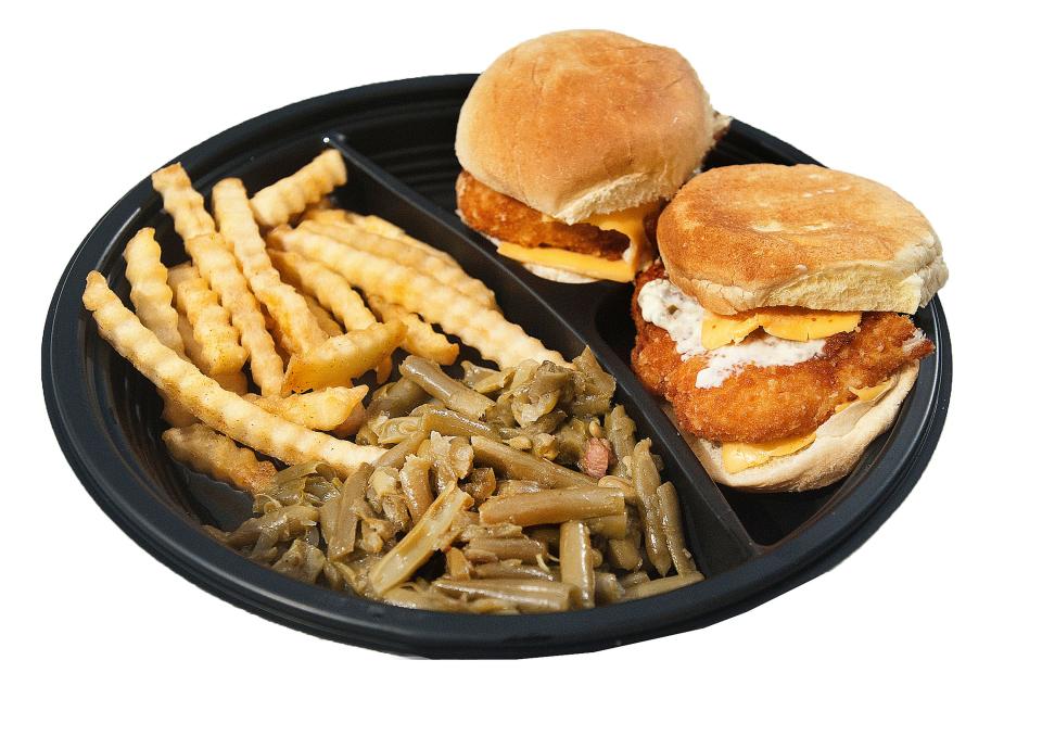 St. Gabriel's men's club serves fish sliders at its weekly fish fry consisting of a fried codfish served with American cheese and tartar sauce atop a slider roll. The dish is accompanied by fries and green beans.Feb. 24,  2020