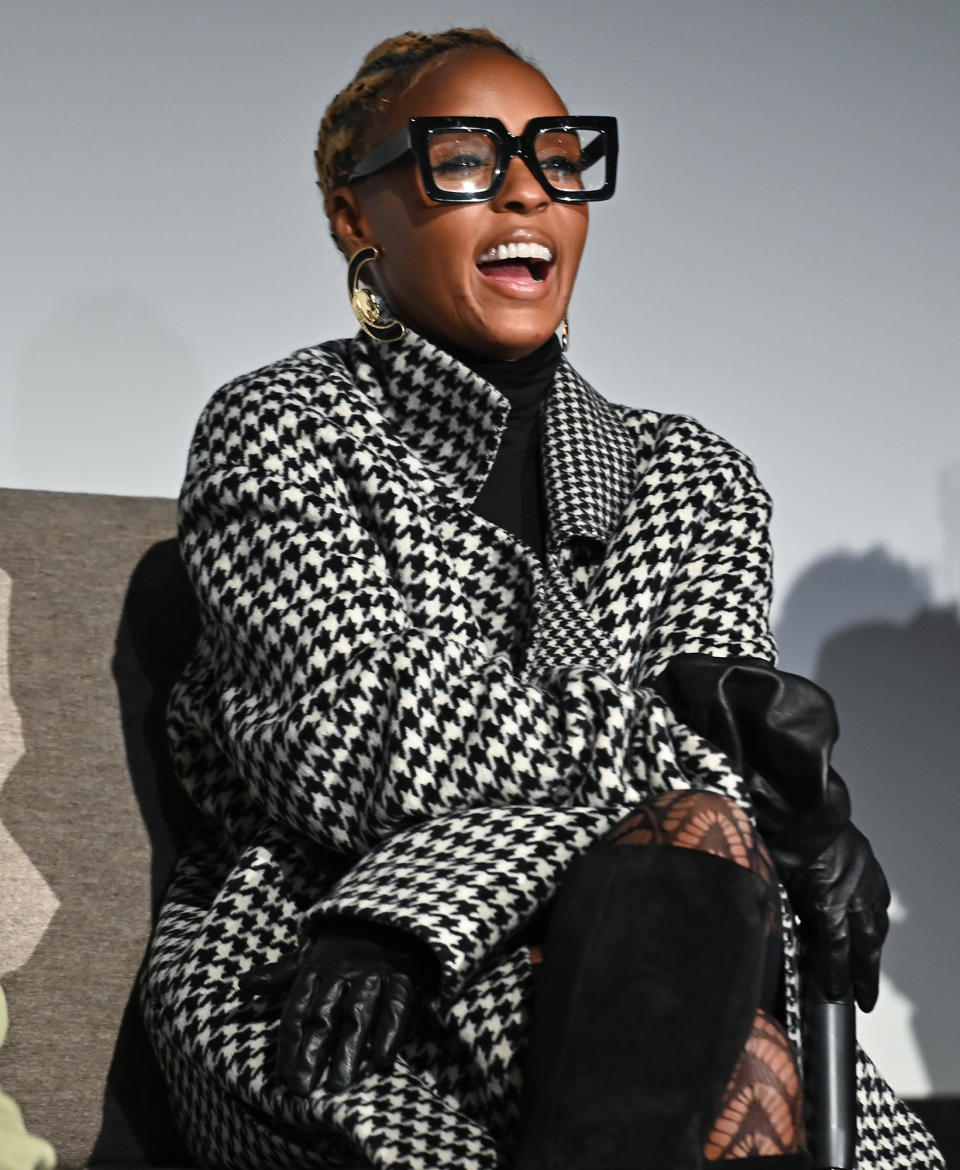 <p>In a houndstooth coat and statement frames, <a href="https://people.com/tag/janelle-monae/" rel="nofollow noopener" target="_blank" data-ylk="slk:Janelle Monáe;elm:context_link;itc:0;sec:content-canvas" class="link ">Janelle Monáe</a> speaks onstage at the N.Y.C. tastemaker screening of her new Netflix film <i>Glass Onion: A Knives Out Mystery</i> on Nov. 21.</p>