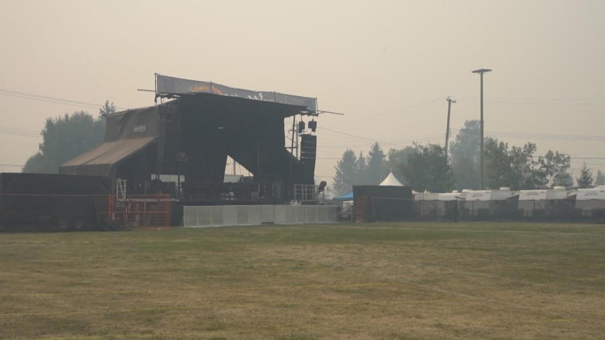 An empty stage after wildfires prompted organizers to call off the second night of the Salmon Arm Roots and Blues Festival. (Tom Popyk/CBC - image credit)