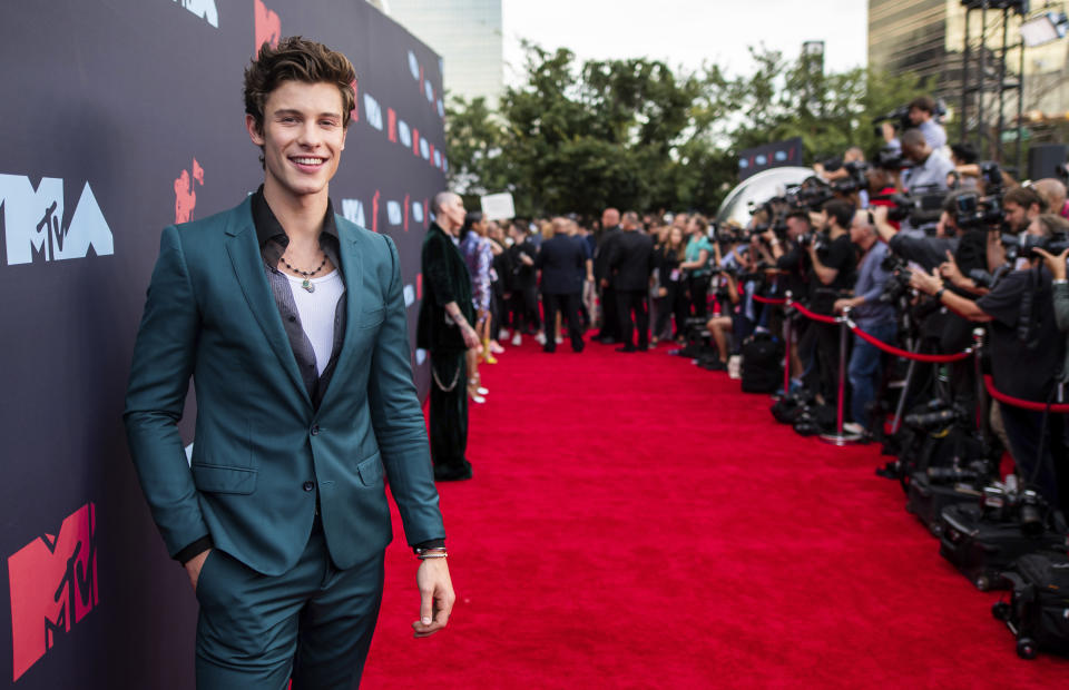 FILE - Shawn Mendes arrives at the MTV Video Music Awards on Aug. 26, 2019, in Newark, N.J. Mendes turns 22 on Aug. 8. (Photo by Charles Sykes/Invision/AP)