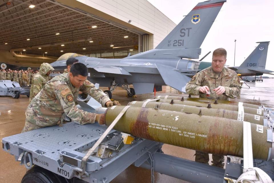 Instructors from the 363rd Training Squadron compete in the combat capability demonstration Nov. 9 at Sheppard Air Force Base. The demonstration was the first chance for Airmen in Training to see bombs being assembled and loaded onto aircraft.