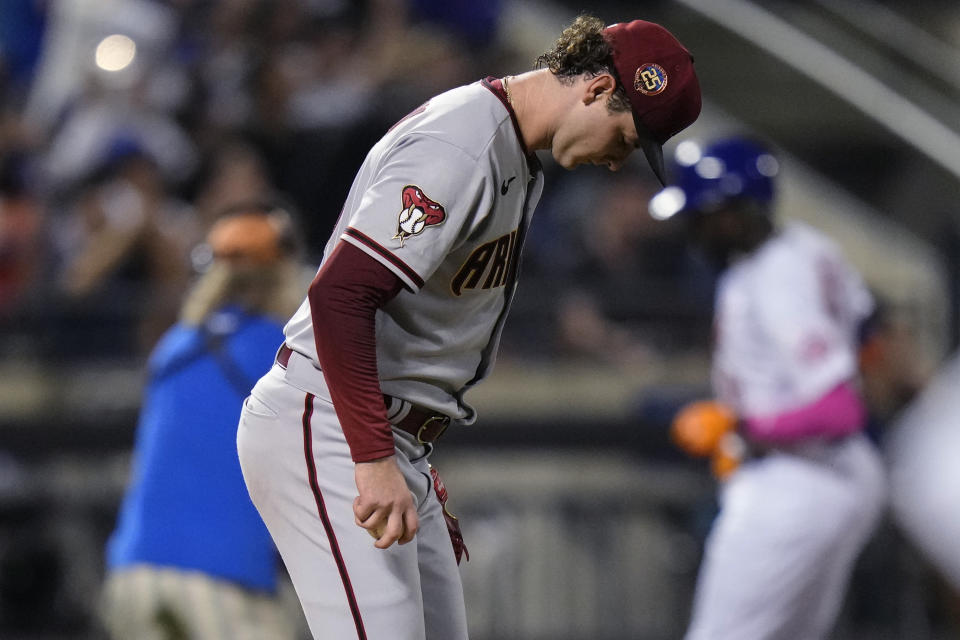 Arizona Diamondbacks starting pitcher Ryne Nelson looks down as New York Mets' Ronny Mauricio runs the bases on a two-run home run during the fourth inning of a baseball game Tuesday, Sept. 12, 2023, in New York. (AP Photo/Frank Franklin II)
