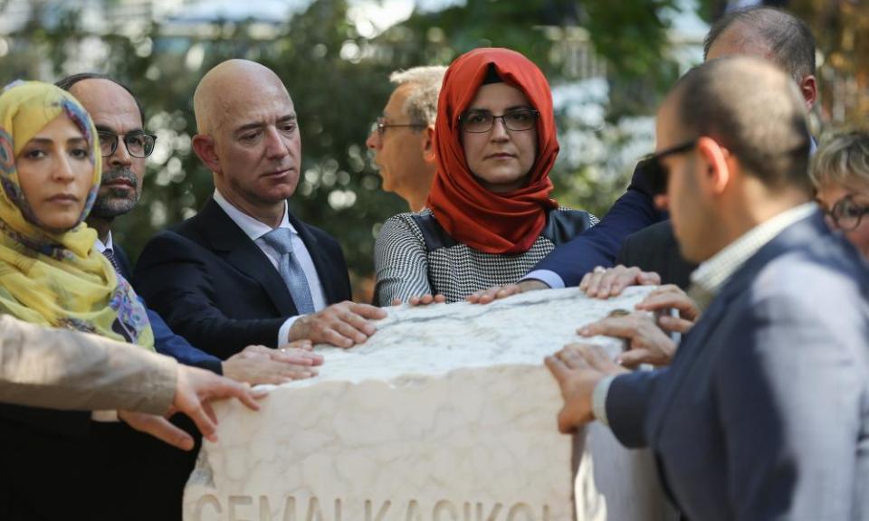 Bezos (third left) and Cengiz (far left) at the unveiling of Khashoggi’s monument on 2 October last year, the first anniversary of the journalist’s murder.