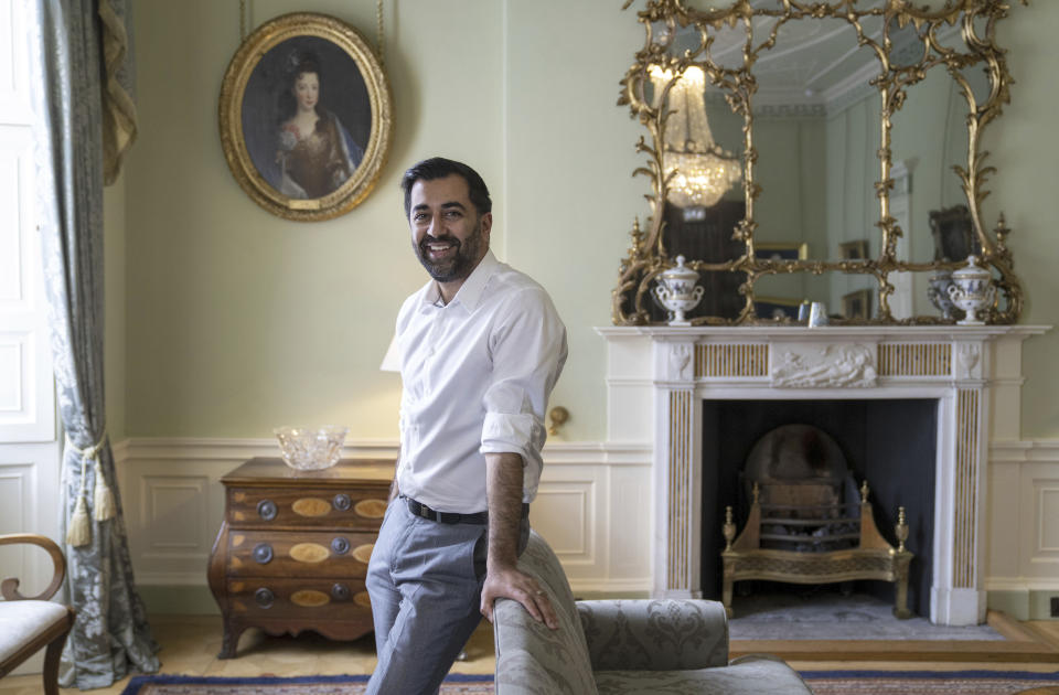 FILE - Scotland's First Minister Humza Yousaf, poses for a photo, at Bute House in Edinburgh, ahead of the SNP National Conference, Oct. 12, 2023. Scotland’s first minister, Humza Yousaf, has resigned on Monday, April 29, 2024, rather than face a no-confidence vote just days after he torpedoed a coalition with the Green Party by ditching a target for fighting climate change. (Jane Barlow/PA via AP, File)