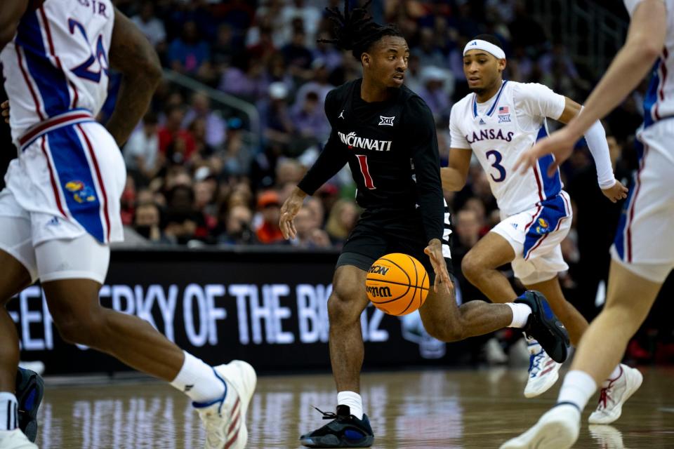 Bearcats guard Day Day Thomas, here in the conference tournament game against  Kansas, averaged 10.4 points per game behind Simas Lukošius and team-leader Dan Skillings Jr. Thomas also topped the team in steals (61) and assists (116).