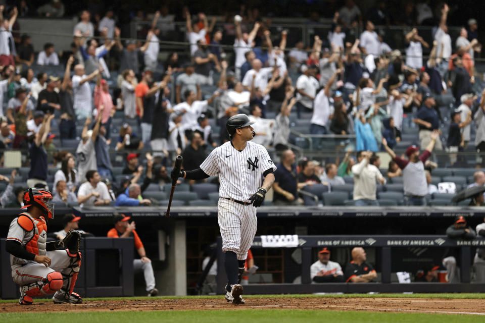 New York Yankees' Gary Sanchez watches his grand slam against the Baltimore Orioles during the second inning of a baseball game on Sunday, Sept. 5, 2021, in New York. (AP Photo/Adam Hunger)