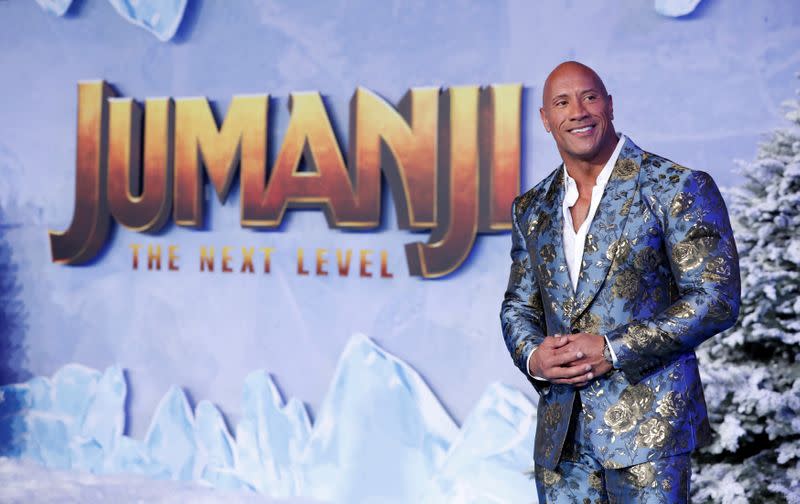 FILE PHOTO: Cast member Johnson poses at the premiere for the film "Jumanji: The Next Level" in Los Angeles