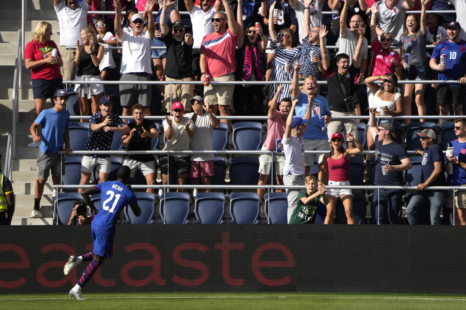 United States' Tim Weah (21) celebrates after scoring during the first half of an international friendly soccer match against Uzbekistan Saturday, Sept. 9, 2023, in St. Louis. (AP Photo/Jeff Roberson)