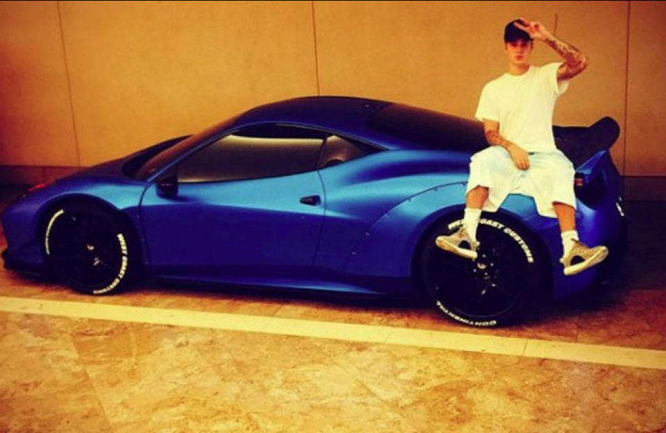 Justin Bieber with his Ferrari (c) Instagram credit:Bang Showbiz