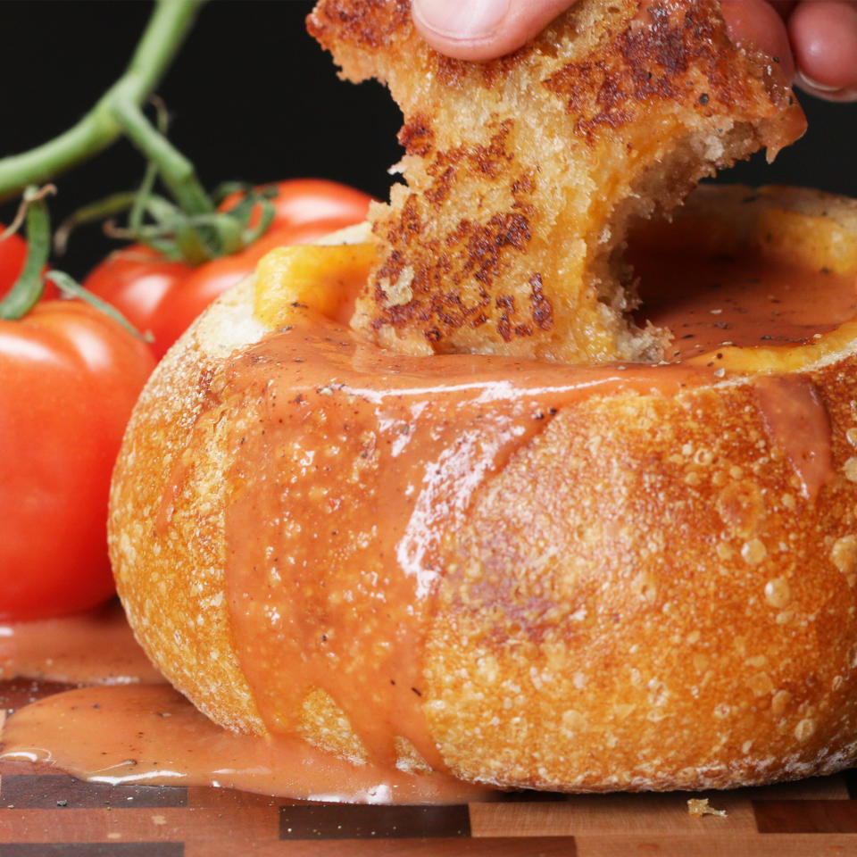 Bread bowl full of tomato soup