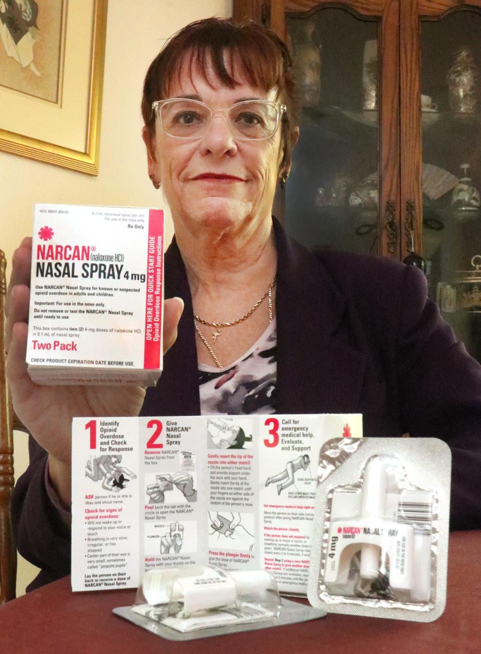 Karen Chrapek, pictured here in August 2020, holds a Narcan Nasal Spray kit, which is used to reverse an opioid overdose. During a town hall in Deltona about opioids on July 12, 2023, Chrapek, executive director of Volusia Recovery Alliance, said everyone should have access to Narcan.