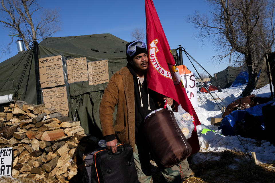 Evan Porter, a veteran of the U.S. Marine Corps, checks into the Oceti Sakowin campground.