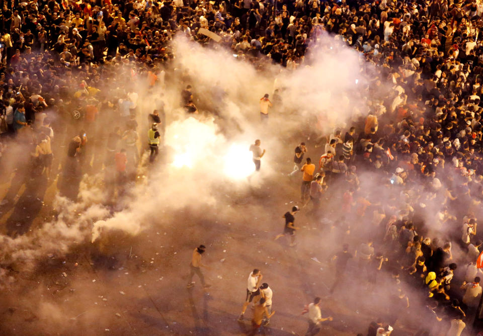 Riot police fire tear gas in Beirut, Lebanon