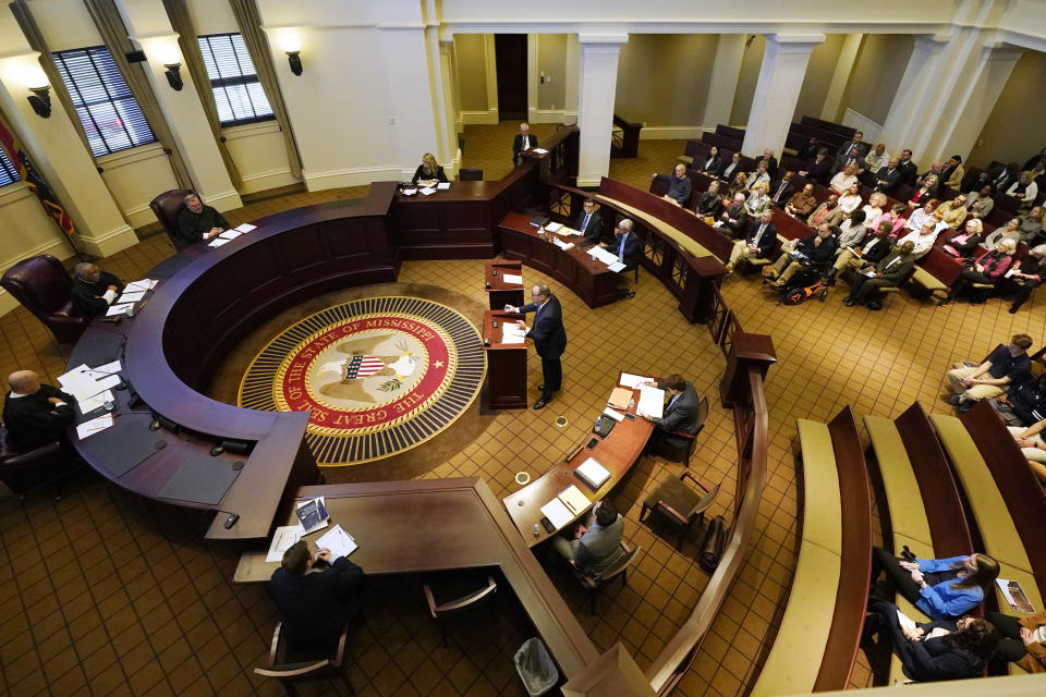 A three-judge panel of the Mississippi Supreme Court listens to arguments over a state law that would put $10 million of federal pandemic relief money into infrastructure grants for private schools, Tuesday, Feb. 6, 2024, in Jackson, Miss. (AP Photo/Rogelio V. Solis)