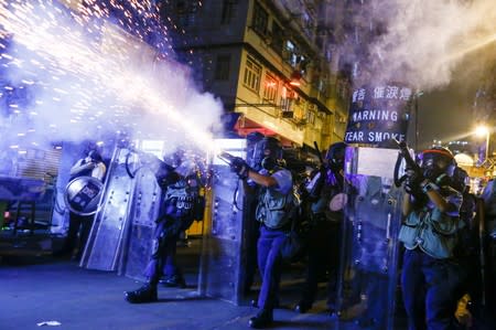 Police fire tear gas at anti-extradition bill protesters during clashes in Sham Shui Po in Hong Kong