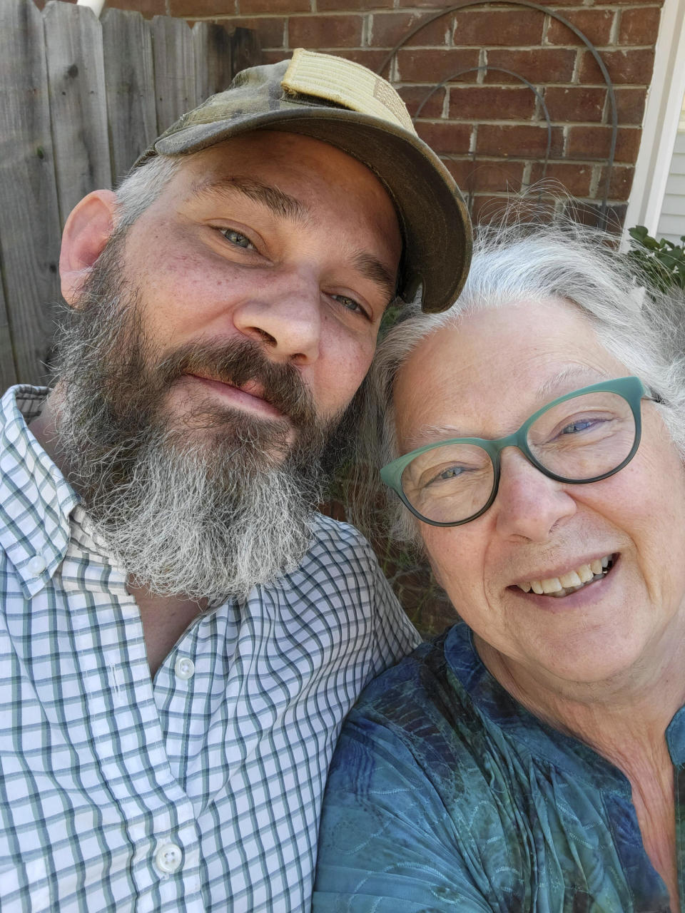 This undated photograph provided by Dianna Shaw shows U.S. military veteran Alexander Drueke of Tuscaloosa, Ala., and his mother, Lois "Bunny" Drueke. Alex Drueke traveled to Ukraine to help with the fight against Russian invaders and was later reported missing. (Lois "Bunny" Drueke/Dianna Shaw via AP)