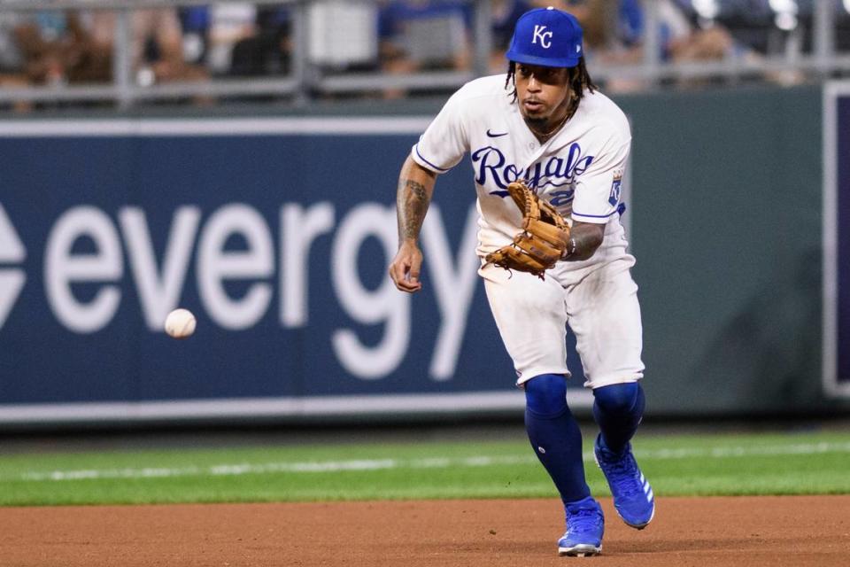 Kansas City Royals third baseman Adalberto Mondesi grabs this grounder off the bat of the Oakland Athletics’ Sean Murphy for an out at first during the seventh inning of a baseball game, Tuesday, Sept. 14, 2021 in Kansas City, Mo. (AP Photo/Reed Hoffmann)