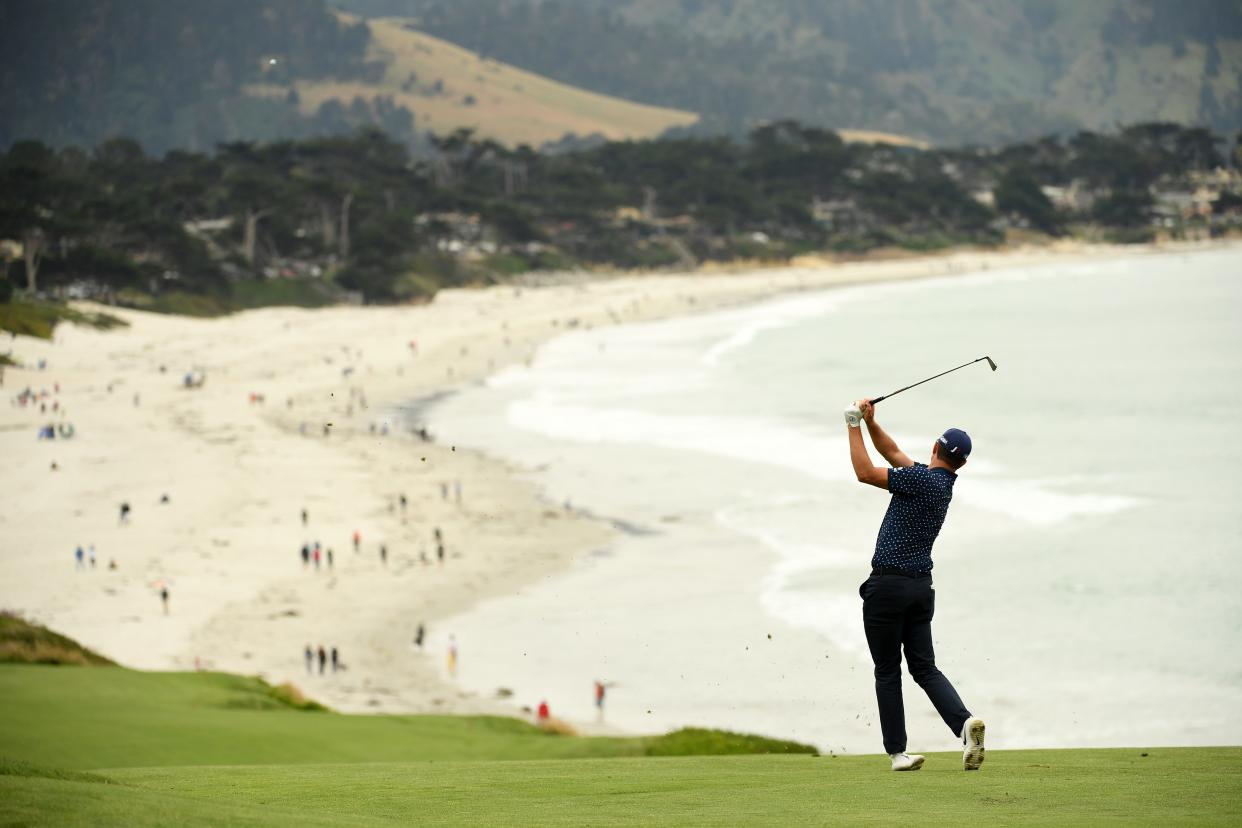 Justin Rose plays a second shot on the ninth hole during the second round of the 2019 U.S. Open at Pebble Beach Golf Links on June 14, 2019 in Pebble Beach, Calif.