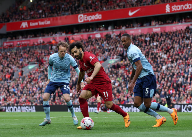 LIVERPOOL, ENGLAND - MAY 06: Mohamed Salah of Liverpool is challenged by Mikkel Damsgaard and Ethan Pinnock of Brentford during the Premier League match between Liverpool FC and Brentford FC at Anfield on May 06, 2023 in Liverpool, England. (Photo by Alex Livesey/Getty Images)
