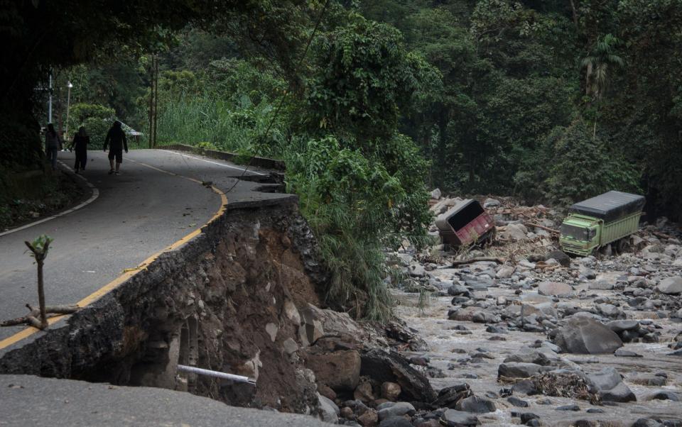 Roads in Tanah Datar were damaged in the aftermath of the landslides