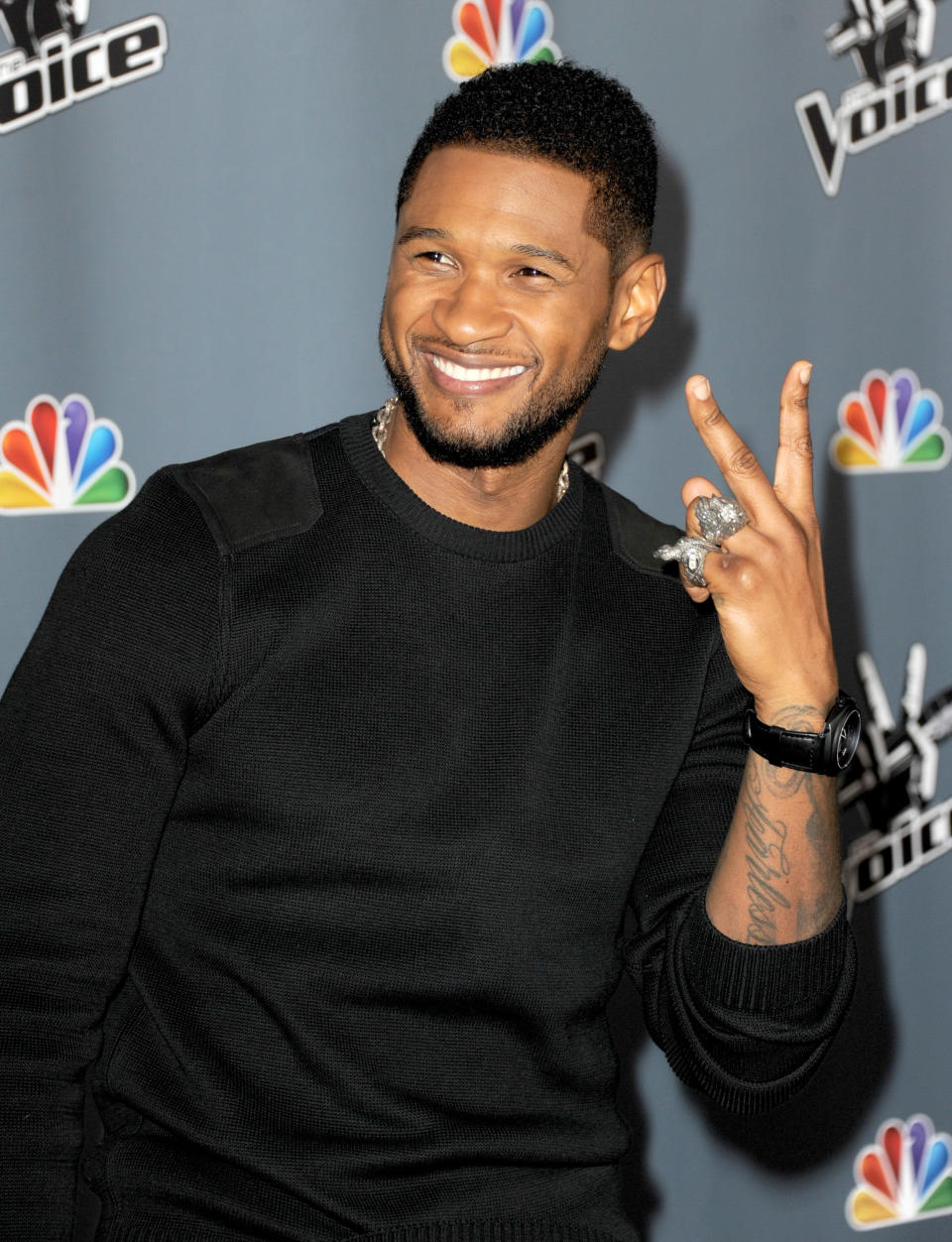 LOS ANGELES, CA - MARCH 20:  Singer Usher arrives at a screening of NBC's 'The Voice' Season 4 at the Chinese Theatre on March 20, 2013 in Los Angeles, California.  (Photo by Kevin Winter/Getty Images)