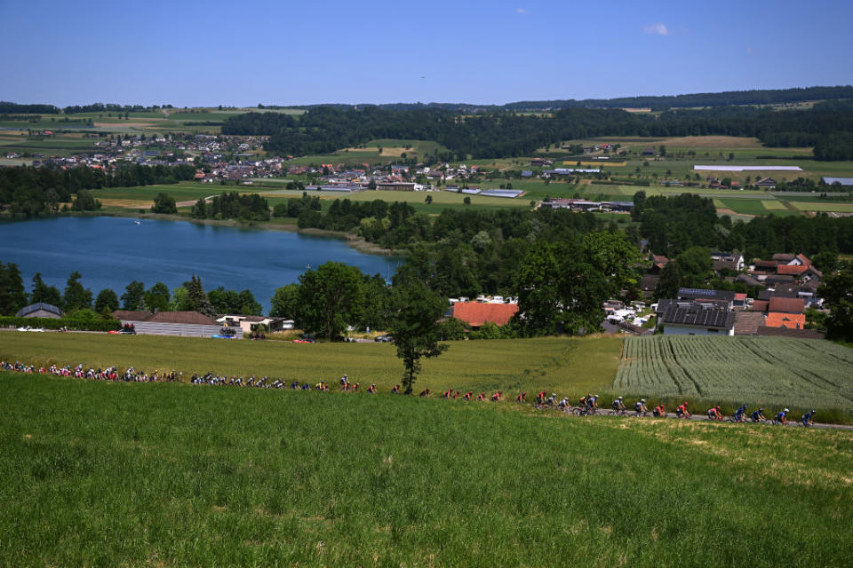 NOTTWIL SWITZERLAND  JUNE 12 A general view of the peloton passing through a landscape during the 86th Tour de Suisse 2023 Stage 2 a 1737km stage from Beromnster to Nottwil  UCIWT  on June 12 2023 in Nottwil Switzerland Photo by Dario BelingheriGetty Images