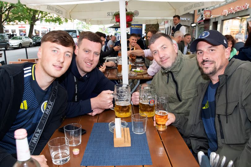 TARTAN ARMY GERMANY MUNICH Pictured - VoxPop after Match - Neil McAndrew from Elgin with son and workers Chris Pirie Lewis mcAndrew and Alan turner ( all window fitters ) Pic Ross Turpie DailyRecord / SundayMail