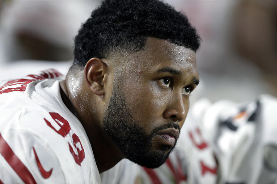 San Francisco 49ers' DeForest Buckner sits on the bench during the second half of the NFL Super Bowl 54 football game against the Kansas City Chiefs Sunday, Feb. 2, 2020, in Miami Gardens, Fla. (AP Photo/Chris O'Meara)