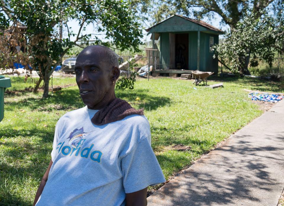 Charlie Miller sits in his yard in Thibodaux, Louisiana, following the passage of Hurricane Ida. Miller lost his daughter and a granddaughter to COVID-19 a few days after the storm, which destroyed his daughter's house and damaged his. Miller, who has had several heart attacks and back surgeries, said the destruction caused by the hurricane was compounded by those deaths. Days after the storm, the Environmental Protection Agency released an analysis detailing how people of color, often in under-resourced communities, are less able to protect themselves and recover after a disaster due to years of disinvestment. The report concluded people of color face disproportionate harm from climate change. And according to the Centers for Disease Control and Prevention, Black Americans are twice as likely to die of COVID-19 as their white neighbors.