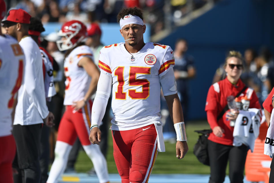 Kansas City Chiefs quarterback Patrick Mahomes (15) walks on the sideline after leaving the medical tent following a hard hit in the second half of an NFL football game against the Tennessee Titans Sunday, Oct. 24, 2021, in Nashville, Tenn. (AP Photo/Mark Zaleski)