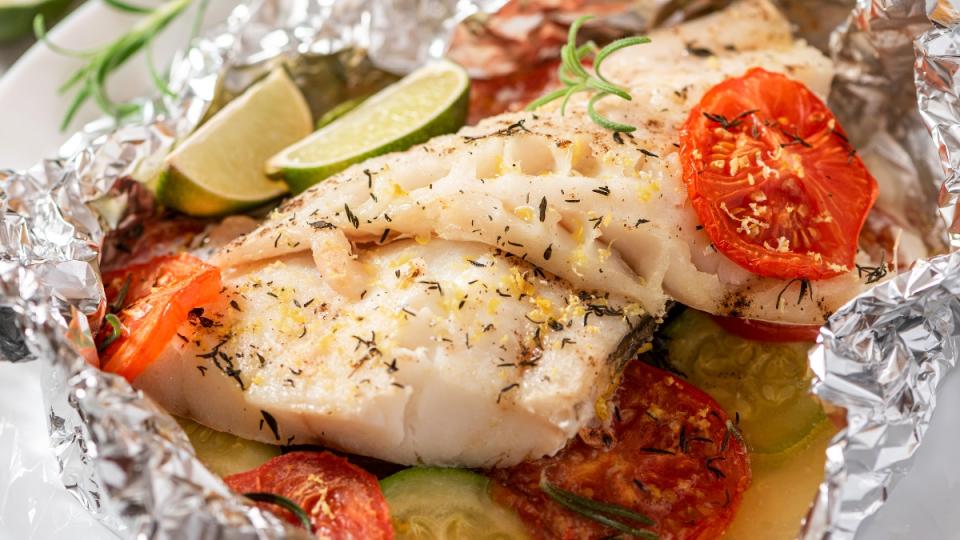 Fish cooked in foil packets to reduce odors