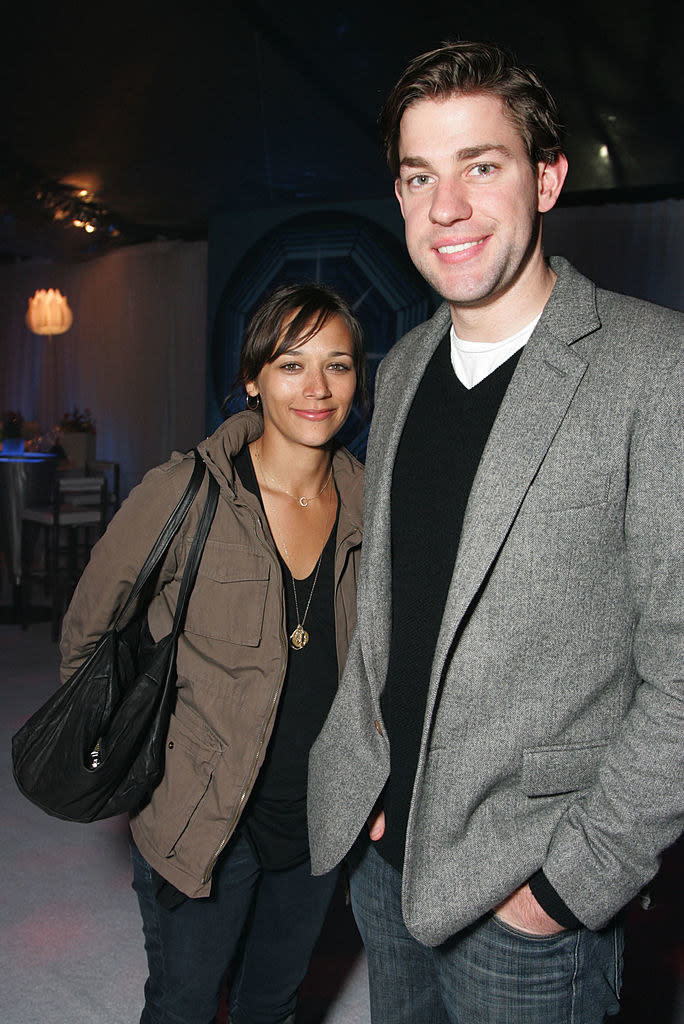 rashida and john at a premiere after party